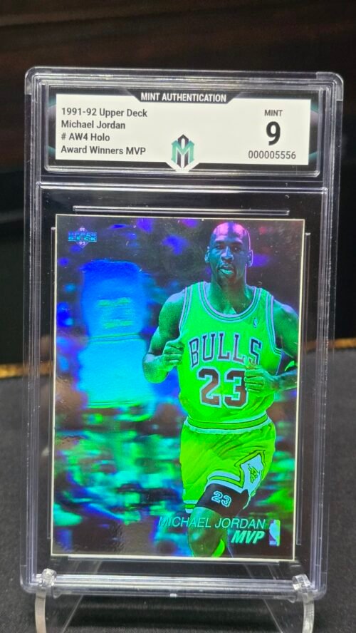 1991-92 Upper Deck Michael Jordan Award Winners MVP Holo — Front Front of 1991-92 Upper Deck Michael Jordan #AW4 Award Winners MVP Holo, graded Mint Authentication Mint 9